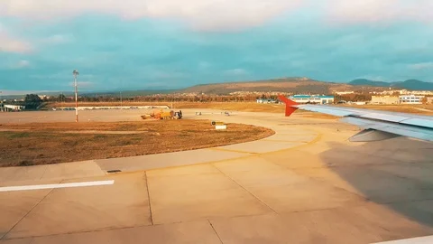 View of the airport from the plane window early in the morning Stock Footage 104411118