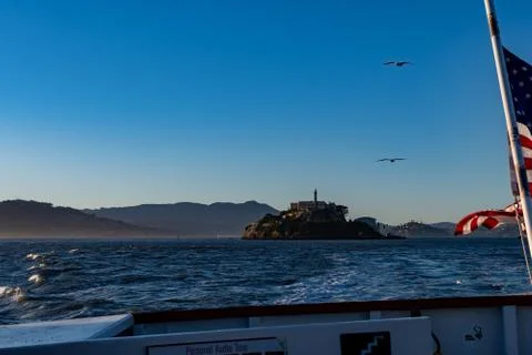 A view of the Alcatraz Island Prison while riding a ferry tour from San Franc Stock Photos