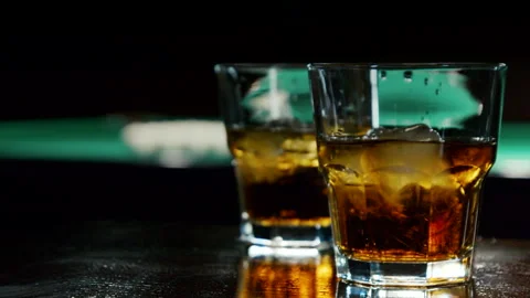 View Of Alcoholic Drink In The Background Billiard's Balls Stock Footage 147875403