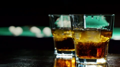 View Of Alcoholic Drink In The Background Billiard's Balls Stock Footage 147875599