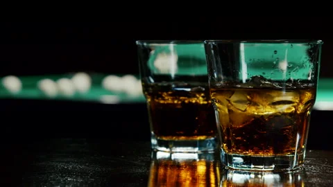View Of Alcoholic Drink In The Background Billiard's Balls Stock Footage 147875792