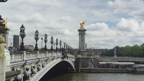 View of the Alexander III Bridge, cloudy sky, many people. Paris Stock Footage 91095595