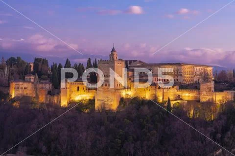 View of the Alhambra, UNESCO World Heritage Site, with the Sierra Nevada Stock Photos