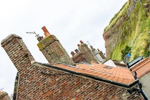 A View Along House Rooftops Seen From The Roof Level Stock Photos