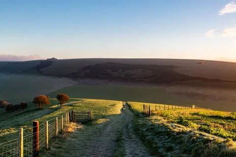 A view along a pathway in the South Downs, on a sunny winter's morning Stock Photos
