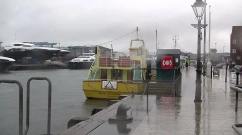 View along the quay in the rain Stock Footage 7139289