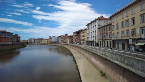 A view along the River Arno flowing through the centre of Pisa, Tuscany Stock Footage 157821971