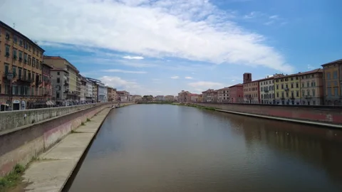 A view along the River Arno flowing through the centre of Pisa, Tuscany Stock Footage 157827673