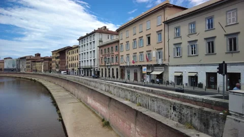 A view along the River Arno flowing through the centre of Pisa, Tuscany Stock Footage 158535542