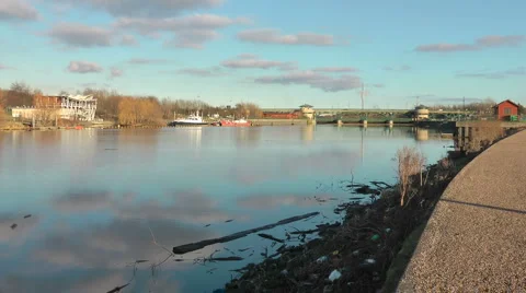 View along river towards Tees Barrage, Sports centre and White Water Course Stock-Footage 1058460