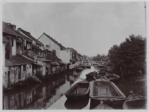 View along a water on Java with homes on either side ... Copyright: xpiema... 스톡 사진