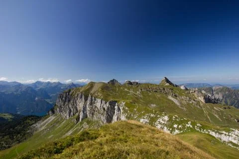 View from an alp in summer on a cloudless day Stock Photos