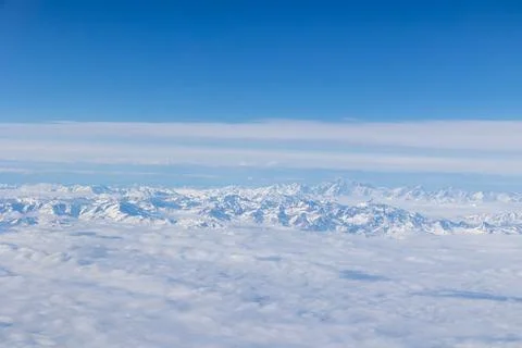 View of the alps from airplane window Stock Photos