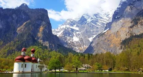 View of the alps from a boat Stock Photos