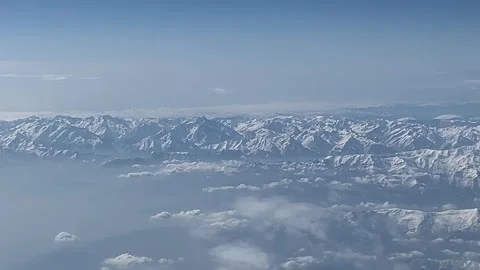 View of the Alps from a windows airplane Stock Footage 313223856