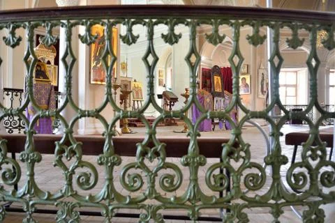 View of the altar through the bars of the staircase of the chape Stock Photos