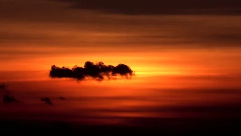 View of amazing orange light effect at sunrise dramatic clouds texture space day Stock Footage 81972323