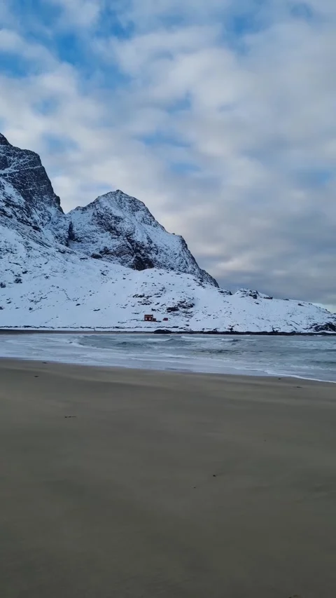 View of amazing sandy Bunes beach with sea and mountains in winter, Lofoten  Stock Footage 319850220