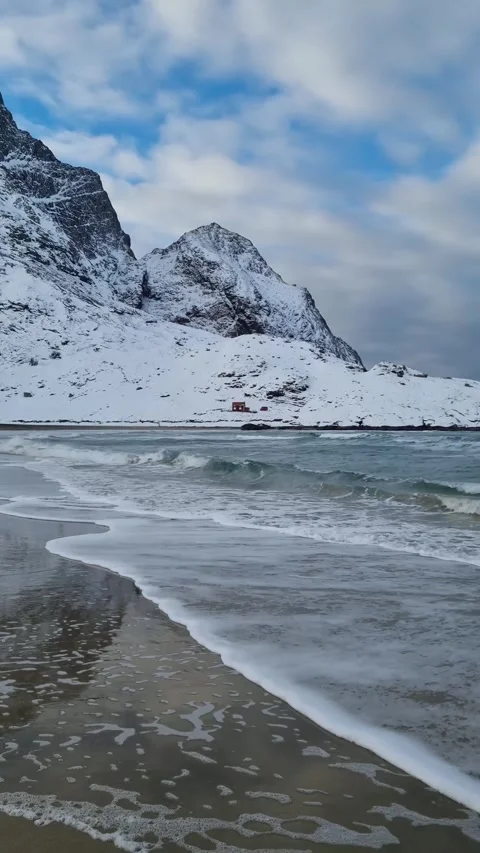 View of amazing sandy Bunes beach with sea and mountains in winter, Lofoten  Video stock 319850276