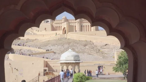 View of the Amer Fort through carved arch, Jaipur, India Stock Footage 101587775
