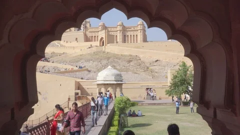 View of the Amer Fort through carved arch, Jaipur, India Stock Footage 101587807