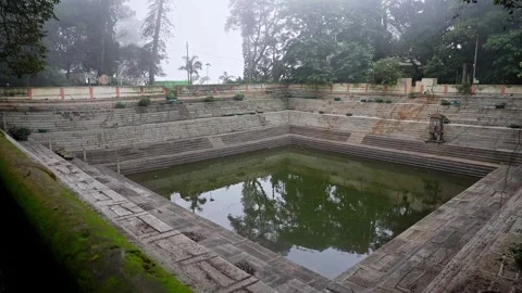 View of Amruth Sarovara historic stepped water tank at scenic nandi hills Stock Footage 339650015