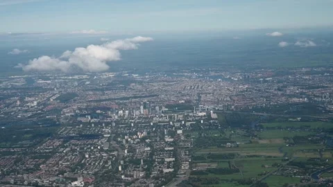 View of Amsterdam, Netherlands from the plane. Flight over Amsterdam. Stock Footage 308475744