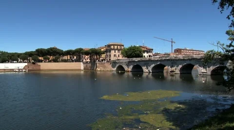 View to the ancient bridge of Tiberius (Ponte di Tiberio) in Rimini, Italy. Stock Footage 59964399