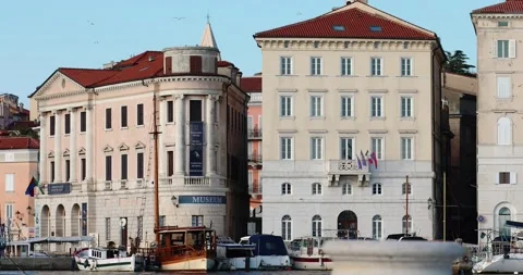View on ancient buildings with red roofs and sailboats and yachts Stock Footage 130462218