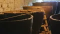 View of ancient cellars with huge clay vats, wine producing, traditions HD Footage