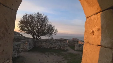 View of the ancient city through the window arch Stock Footage 99939430