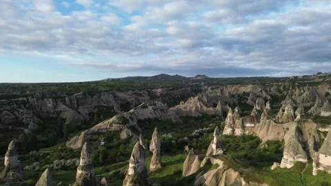 View of Ancient Dovecotes Carved in Volcanic Cliffs Stock Footage 336489415