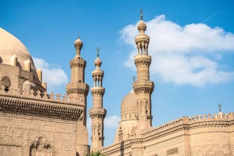 .View of the ancient minarets of the Cairo mosque Sultan Hassan on a sunny da Stock Photos