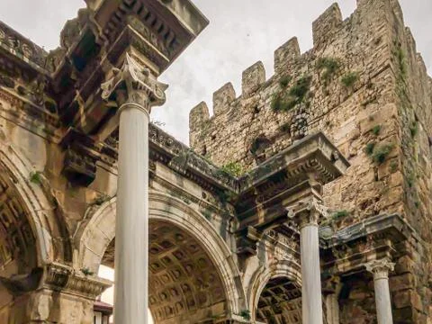 View of ancient monument Hadrian's Gate Uckapilar in old city of Antalya Stock Photos
