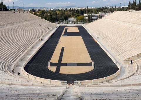 View of the ancient stadium of the first Olympic Games in white marble Stock Photos