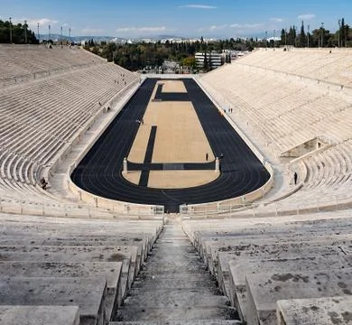 View of the ancient stadium of the first Olympic Games in white marble Stock Photos