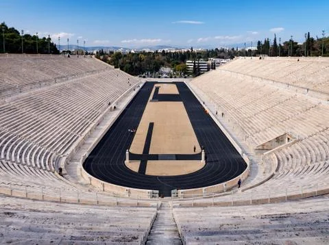 View of the ancient stadium of the first Olympic Games in white marble Stock Photos