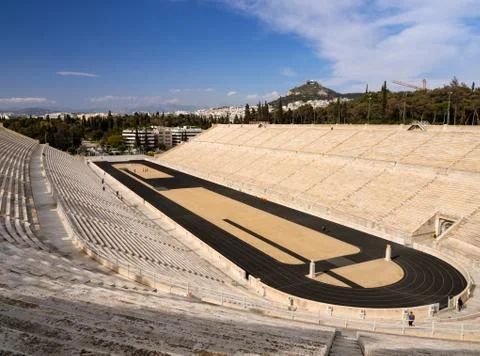 View of the ancient stadium of the first Olympic Games in white marble Stock Photos