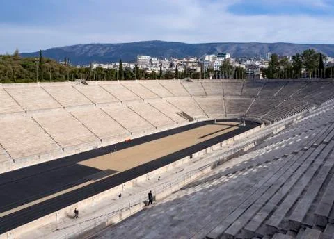 View of the ancient stadium of the first Olympic Games in white marble Stock Photos