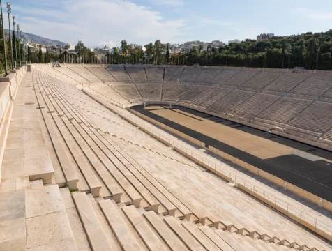 View of the ancient stadium of the first Olympic Games in white marble Stock Photos