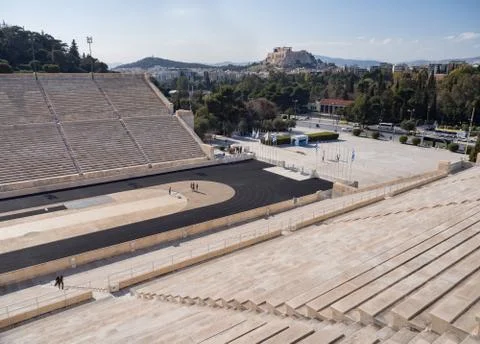 View of the ancient stadium of the first Olympic Games in white marble Stock Photos