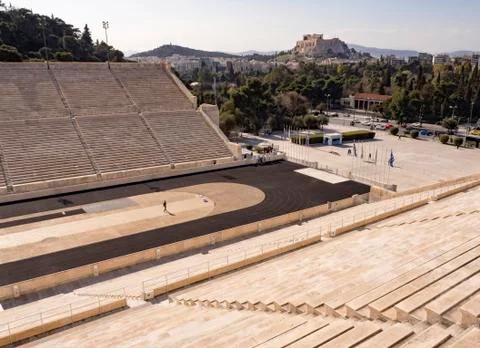 View of the ancient stadium of the first Olympic Games in white marble Stock Photos