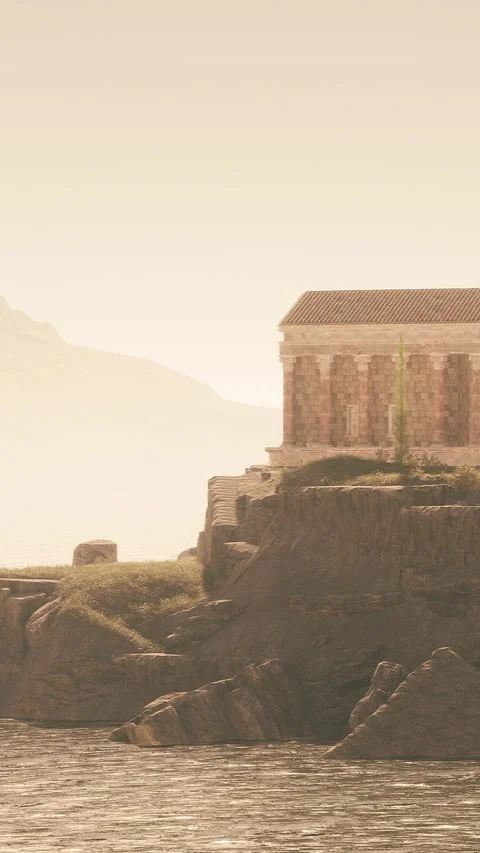 View of ancient structure on rocky coast at sunset with mountains in background Stock Footage 341053838