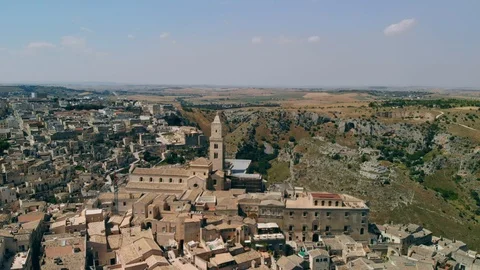 View of ancient town of Matera Sassi di Matera in sunny day, drone shot Stock Footage 111862378