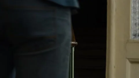 A view and a scene of a man entering or leaving Stock-Footage 129733293