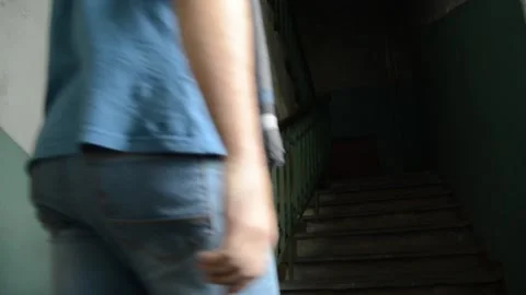 The view and the scene of a man walking, going down Stock-Footage 129733527