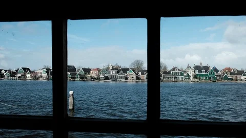 View and windows on the canal. Beautiful architecture old wooden houses Zaandam Stock Footage 110798914