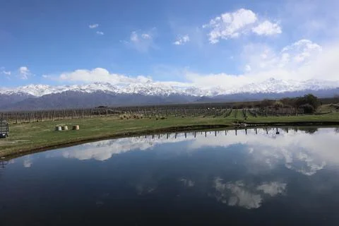View of the Andes and its reflection in a lake in the Mendoza region, Argentina Stock Photos
