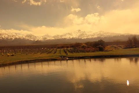 View of the Andes and its reflection in a lake in the Mendoza region, Argentina Stock Photos