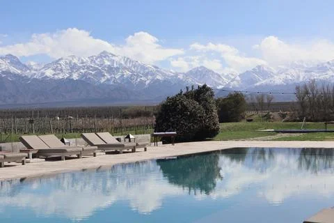 View of the Andes and its reflection in a lake in the Mendoza region, Argentina Stock Photos